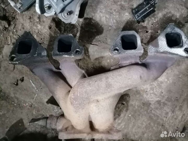 Коллектор выпускной Nissan CD20