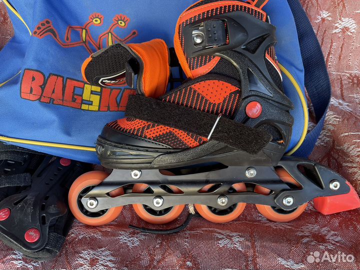 Роликовые коньки