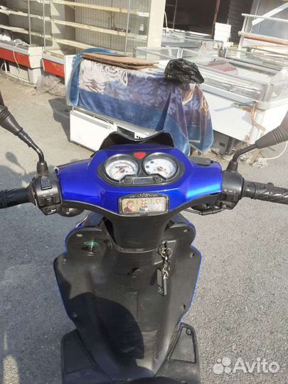 Скутер мопед
