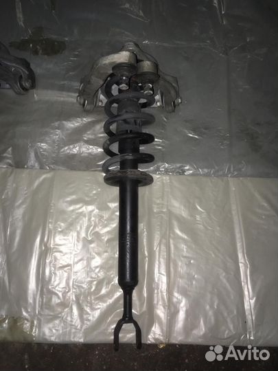 Задний амортизатор Audi A6 2005