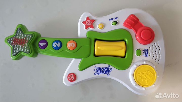 Музыкальная игрушка- гитара детская