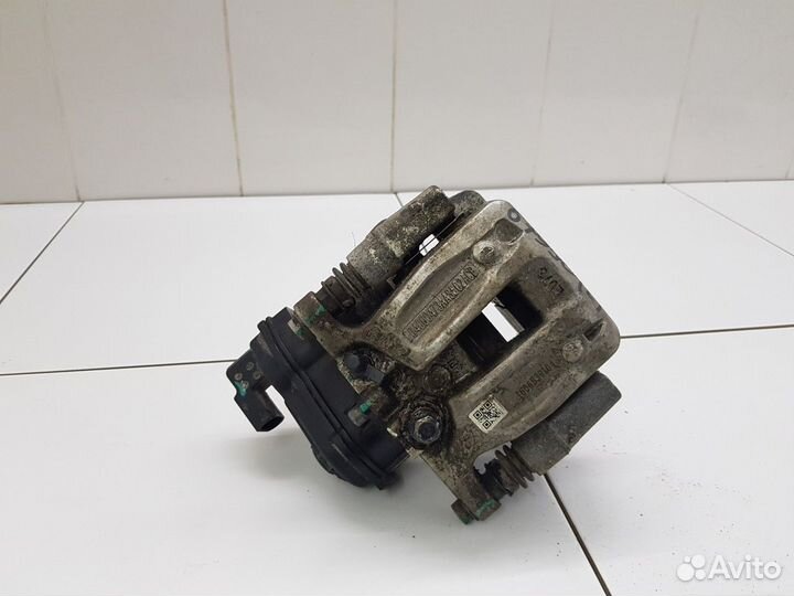 Суппорт задний левый (Chery Tiggo 7 Pro)