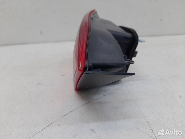 Фонарь в крышку багажника левый Toyota Camry XV70