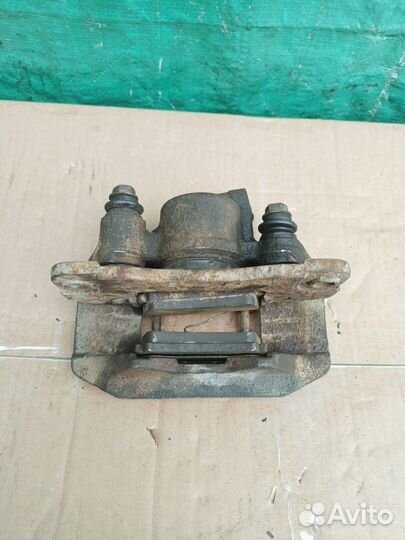 Суппорт тормозной зад левый Pajero Sport 2008-2015