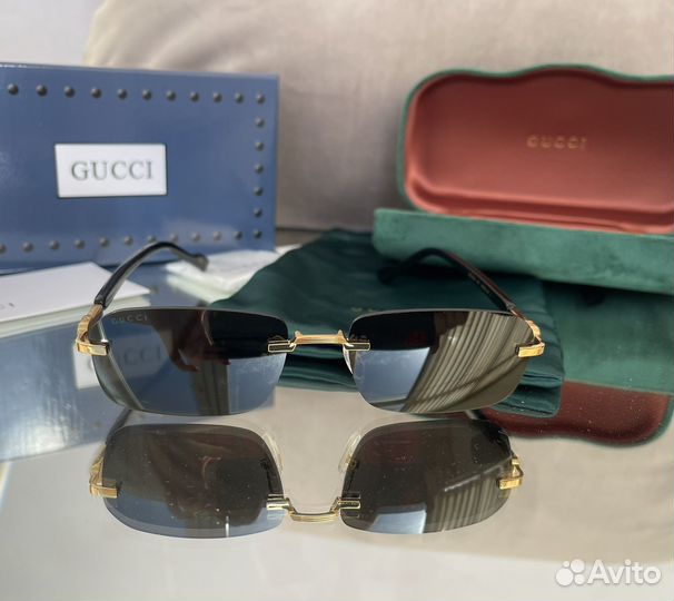 Солнцезащитные очки Gucci