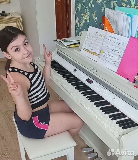 Репетитор по игре на фортепиано