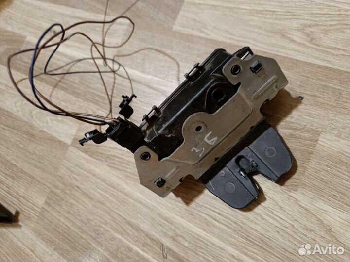 Замок крышки багажника opel astra h