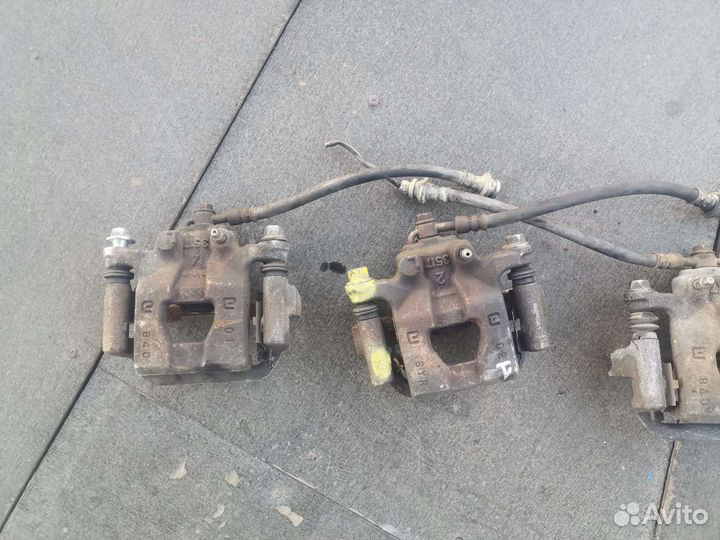 Суппорт задний левый правый Nissan X-Trail T31