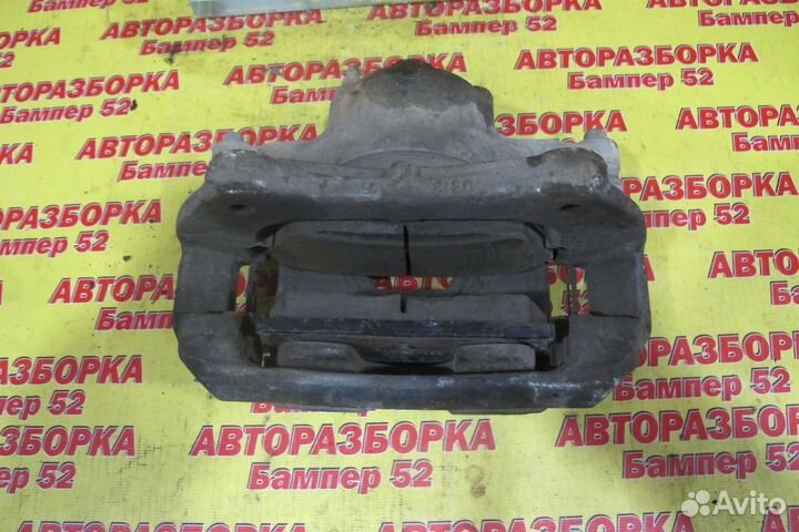 Суппорт тормозной передний левый Chevrolet Cruze