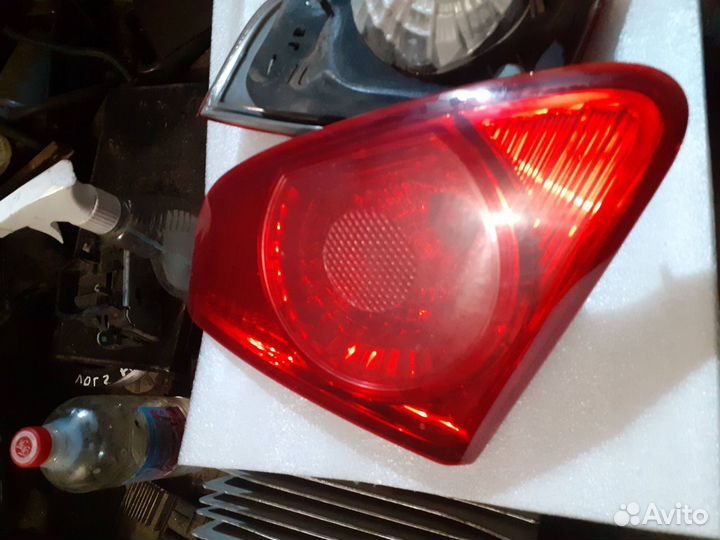 Фонарь задний левый Toyota Corolla E150