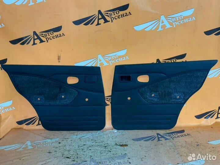 Обшивка боковой двери задняя Daewoo Nexia седан