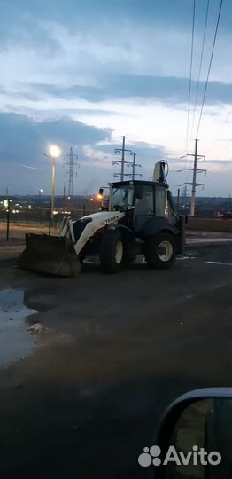 Эксковатор - погрузчик