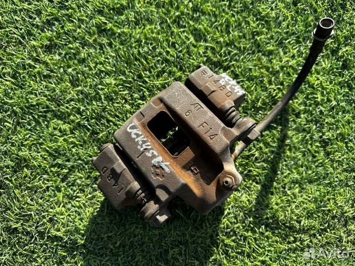 Суппорт тормозной задний левый Toyota Sequoia