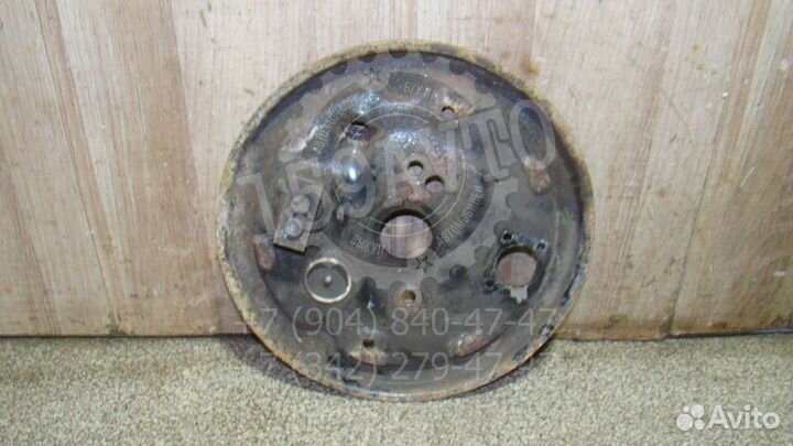 Щит опорный задний левый Opel Corsa D