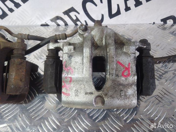 Суппорт тормозной передний левый Hyundai Ix35 I