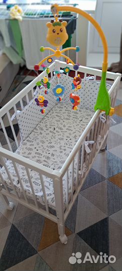 Детская кроватка Tomy Mia(без игрушки)