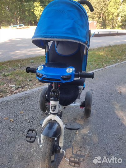 Детский велосипед с ручкой Moby Kids