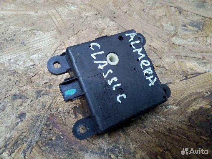 Моторчик заслонки отопителя Nissan Almera Classic