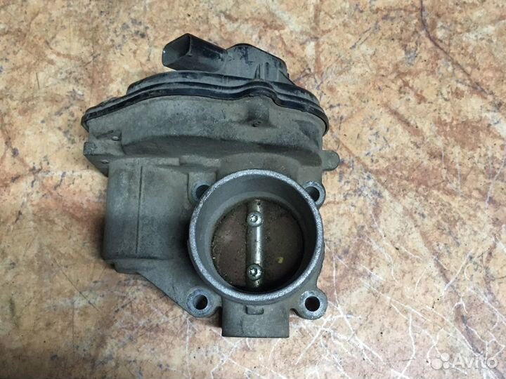 Дроссельная заслонка Ford Fiesta 1.4