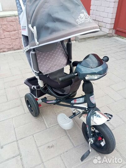 Трехколесный велосипед с ручкой