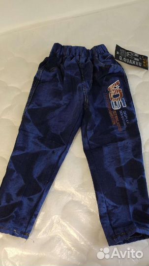 Джинсы новые