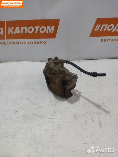 Суппорт тормозной передний левый Opel Astra