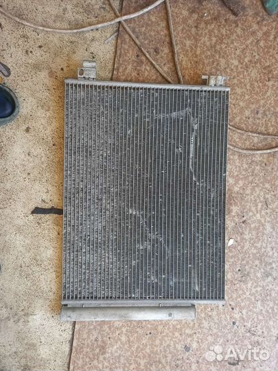 Радиатор кондиционера Рено логан 2
