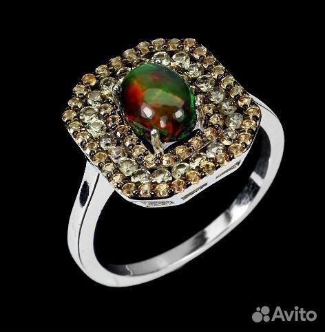 Серебряное кольцо с черным опалом и сапфирами