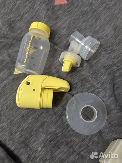 Молокоотсос medela электрический