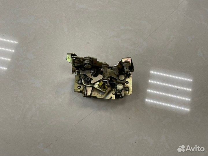 Замок боковой двери задний левый Daewoo Nexia