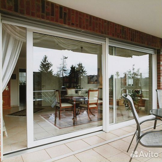 Раздвижные алюминиевые двери на балкон