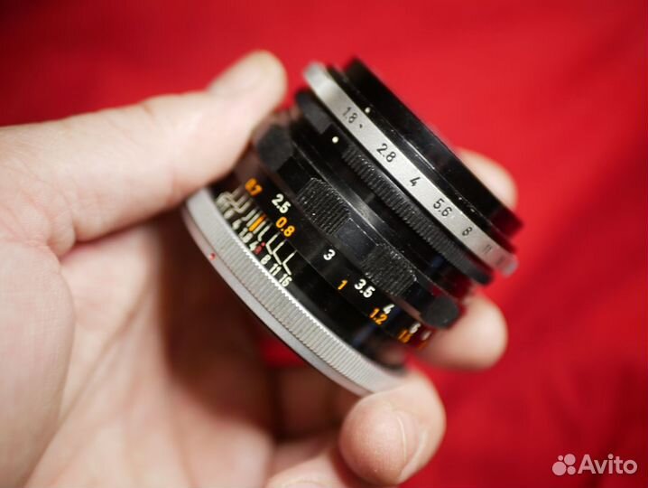 Canon FD canon lens FL 50mm f1,8 светлый полтоситк
