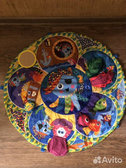 Игрушка Lamaze Коврик Крутись и Развивайся