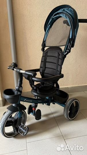 Трехколесный велосипед с ручкой