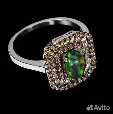 Серебряное кольцо с черным опалом и сапфирами