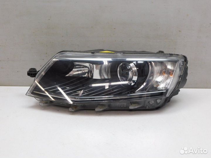 Фара левая Skoda Octavia