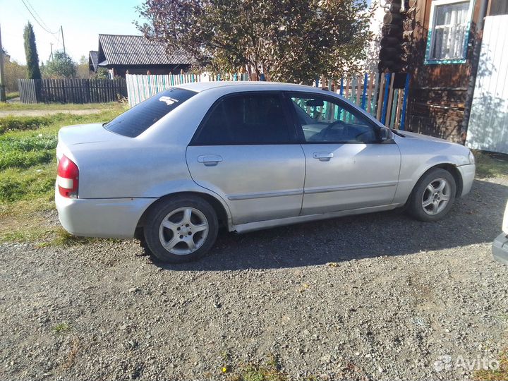Mazda Familia 1.5 AT, 1999, 300 000 км