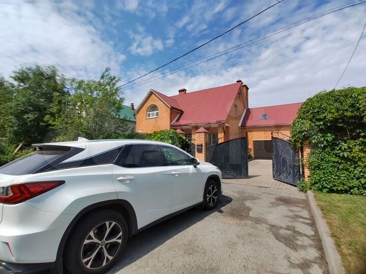 Коттедж 263 м² на участке 12,5 сот.