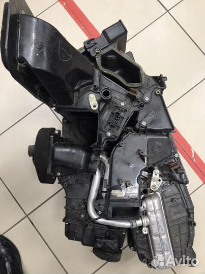 Nissan tiida корпус печки отопителя