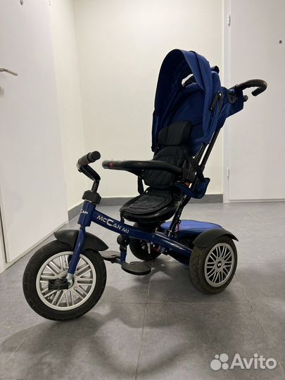 Трехколесный велосипед с ручкой