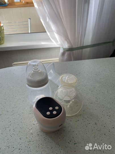 Молокоотсос электрический