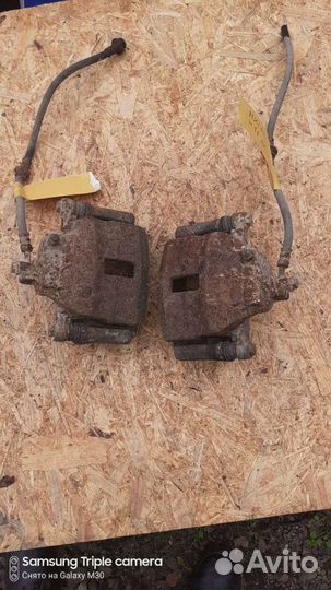 Суппорт передний Nissan almera n16