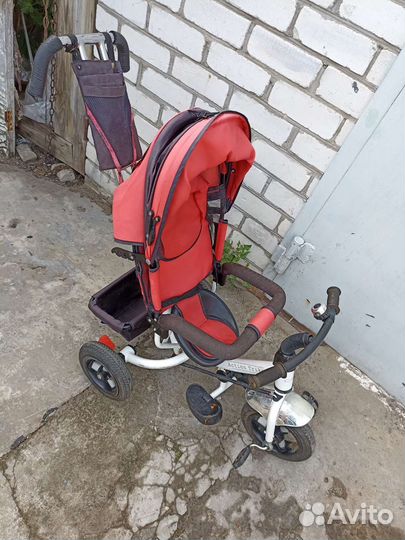 Велосипед коляска с родительской ручкой