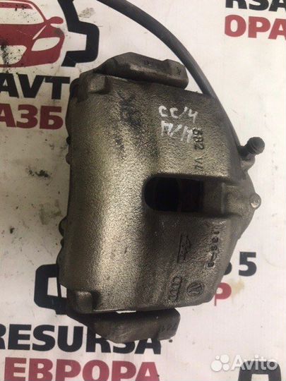 Суппорт тормозной передний правый Vw Passat Cc B6