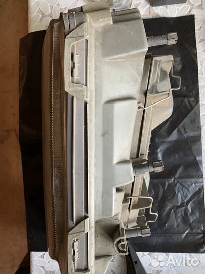 Фара правая Hella w124