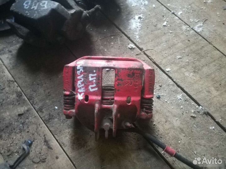 Митсубиси Каризма суппорта передние