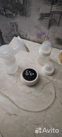 Молокоотсос электрический