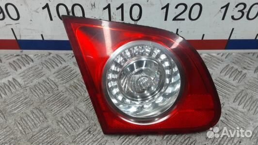 Фонарь левый крышки багажника volkswagen passat B6