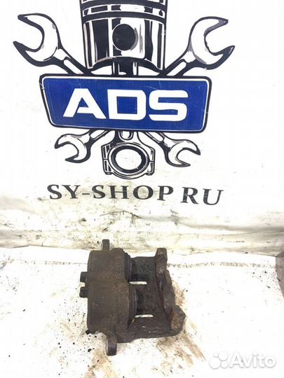 Суппорт тормозной передний левый Ssangyong Actyon