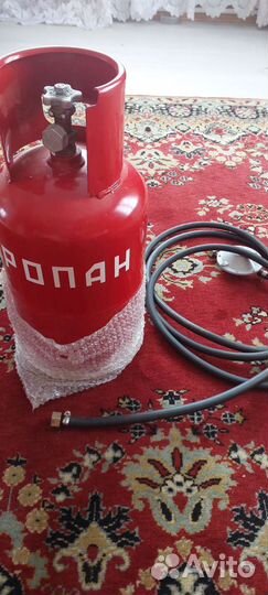 Газовый балон и шланг